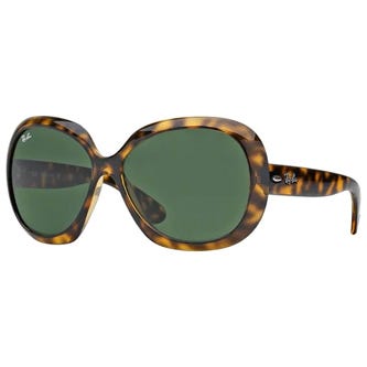 Oversized tortoiseshell sunglasses with green lenses.