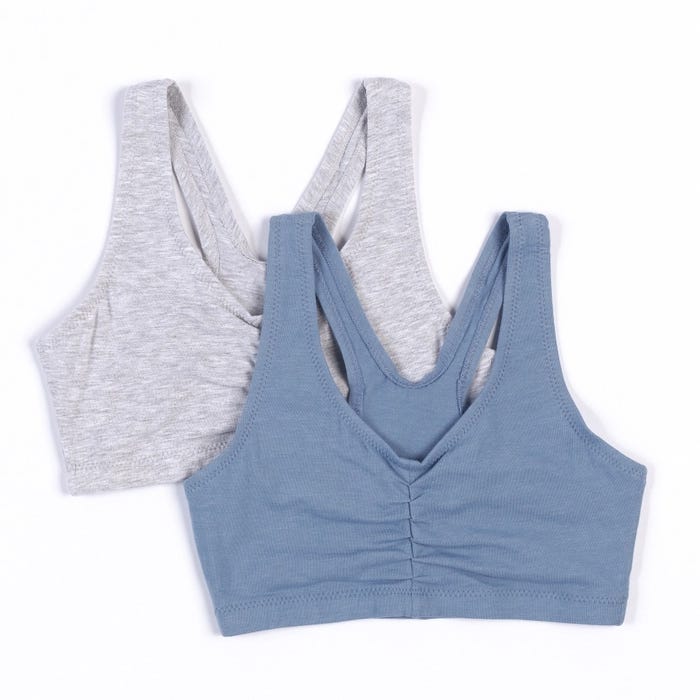 Two seamless, racerback bralettes in soft blue and light gray, featuring a V-neck design with gathered fabric at the front for added comfort.