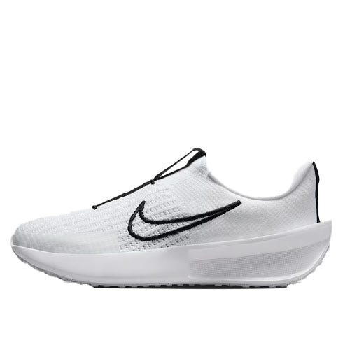 White athletic shoe with a black swoosh logo, featuring a minimalist design and a thick cushioned sole.