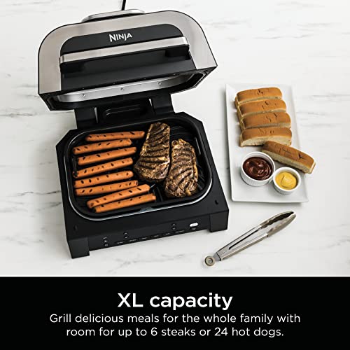 Ninja Foodi XL Cooker, an indoor electric grill with a large capacity to cook up to 6 steaks or 24 hot dogs, depicted with food on its grill plate.