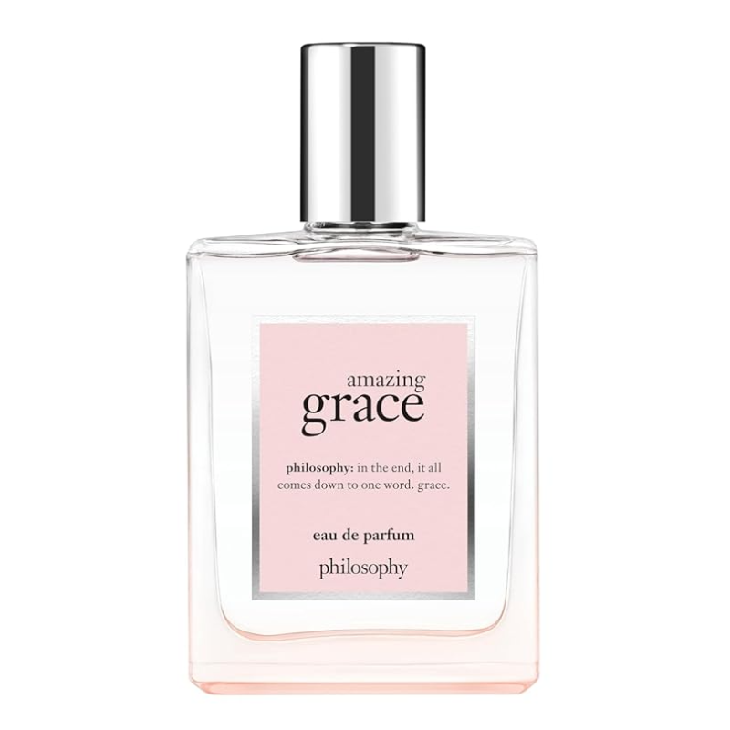 A bottle of Philosophy Amazing Grace Eau de Parfum, featuring a sleek design with a silver cap and a pink label displaying the fragrance name.