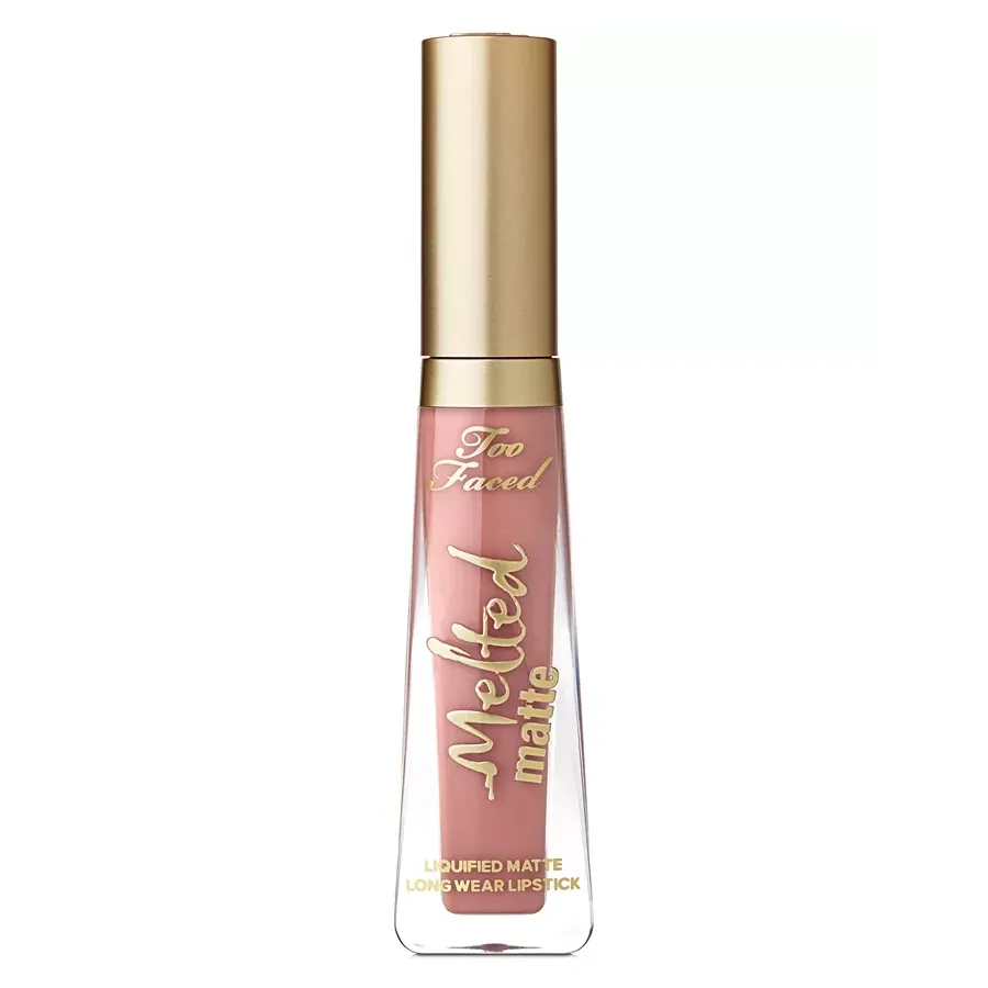 A tube of pink liquid matte lipstick with a gold cap.