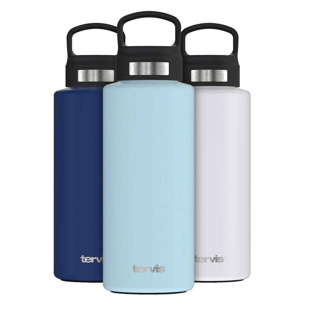 Three Tervis insulated stainless steel water bottles in dark blue, light blue, and white, each with a black handle and stainless steel accent.