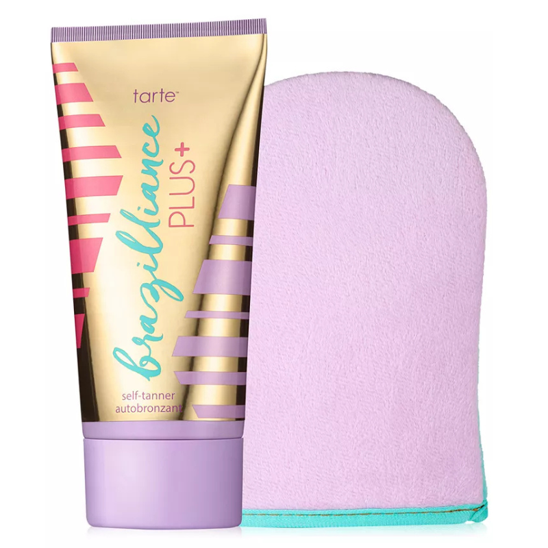 Tarte Brazilliance Plus+ 2pc Self Tanner includes a tube of self-tanning lotion and an application mitt, featuring a lavender and gold color scheme with pink accents.