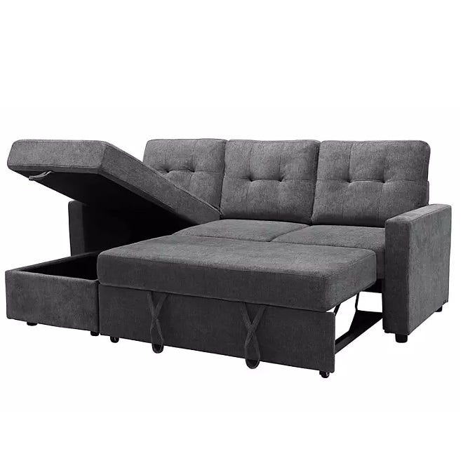 Gray sectional sofa with tufted upholstery and a pull-out sleeper, featuring built-in storage.