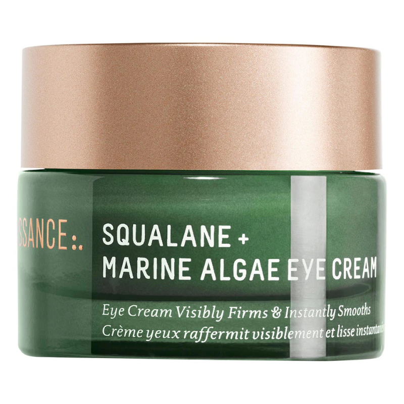 Biossance Squalane + Marine Algae Eye Cream is in a green jar with a gold lid, designed to visibly firm and instantly smooth the eye area.