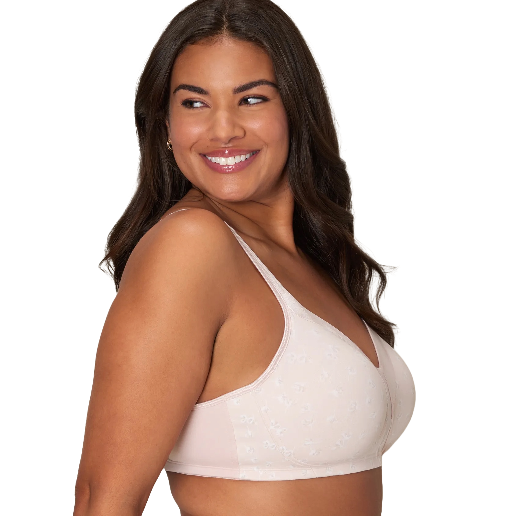 A woman models a light pink bra featuring thin straps and subtle floral embroidery, suitable for a range of sizes.