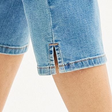 Light blue denim capris with a cuffed hem, featuring a visible seam along the side of the leg.