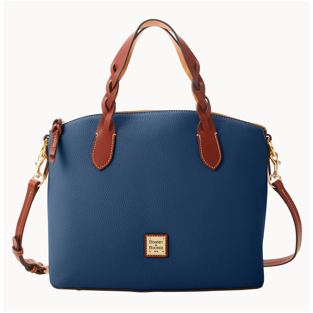 Blue handbag with brown handles and gold-tone hardware, featuring a detachable strap and a brand logo plaque on the front.