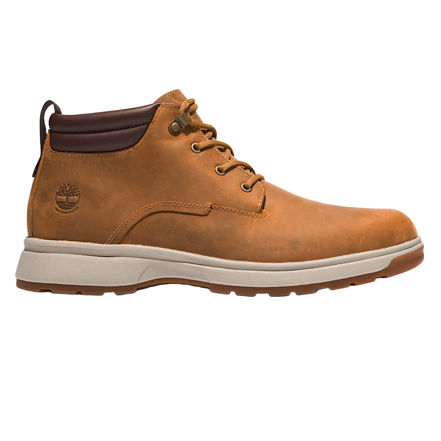 Timberland GreenStride Chukka Boots feature a tan leather upper with a dark brown padded collar, lace-up closure, and a white, cushioned outsole. The boot is designed to be waterproof and displays the Timberland logo on the side.