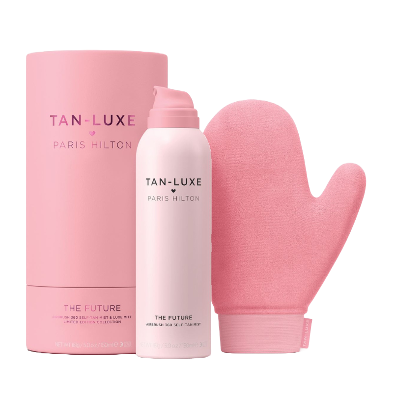 A TAN-LUXE self-tan mist bottle and a pink mitt, both labeled \“PARIS HILTON.\“