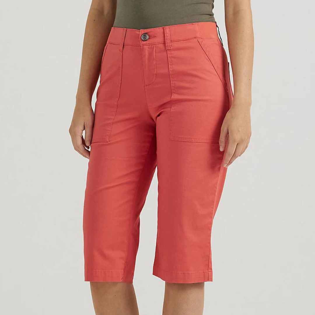 A person wearing red knee-length shorts.