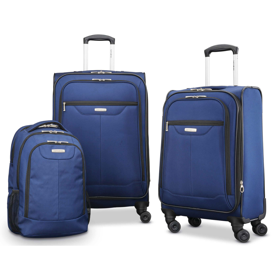 Two blue suitcases of different sizes with wheels and telescoping handles, and a matching blue backpack.