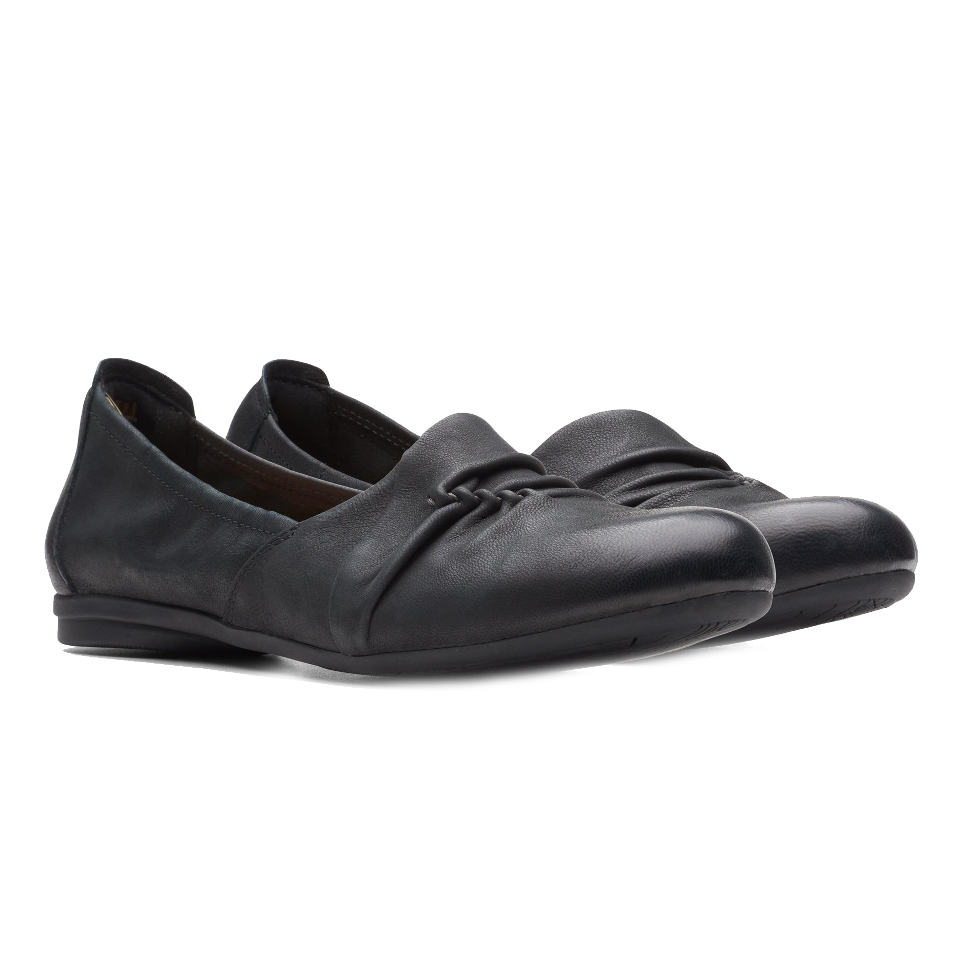 Black leather flats featuring a rounded toe design with a center-seam detail and slip-on style, complemented by a subtle strap over the vamp.