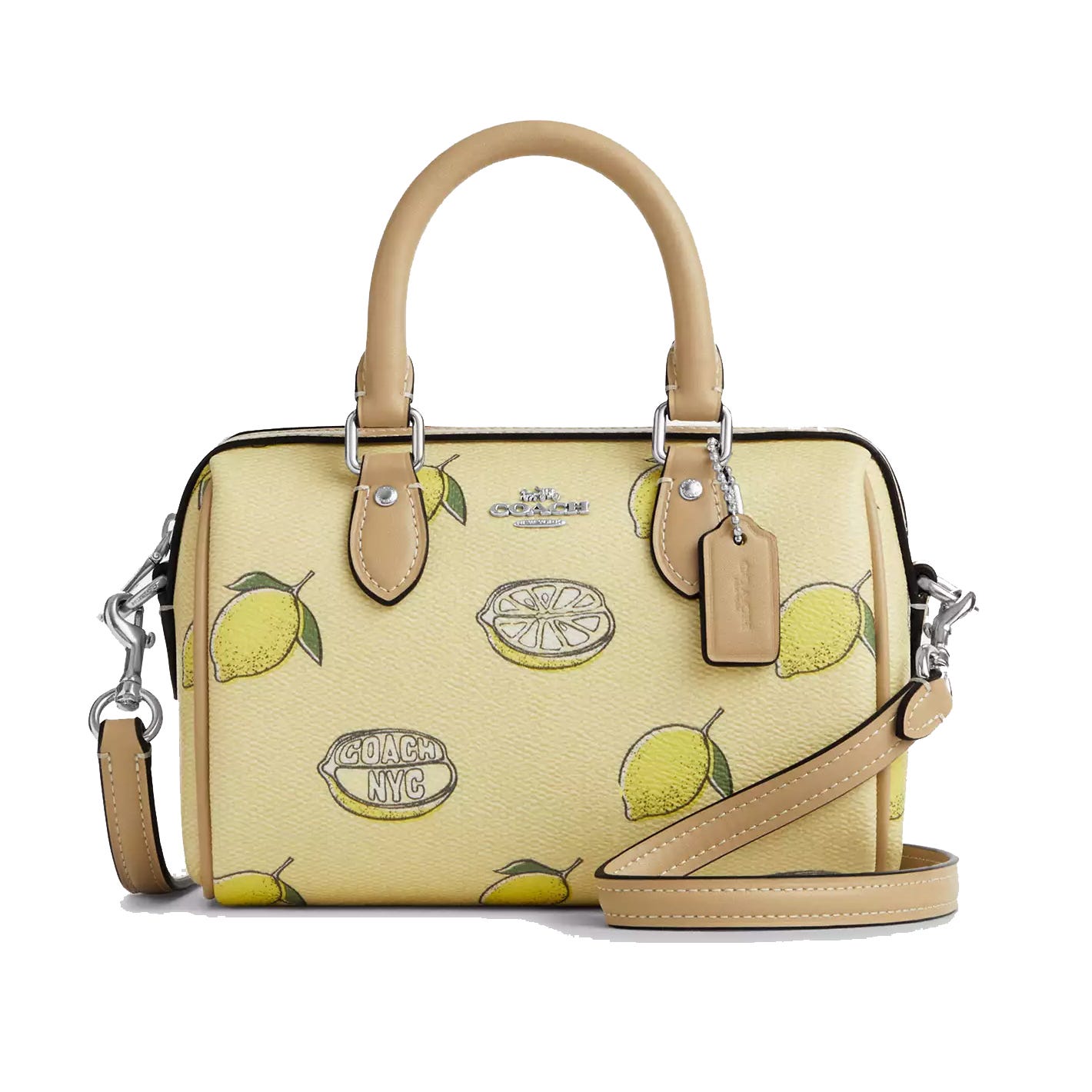 Coach handbag featuring a lemon print design, with beige handles and detachable strap.
