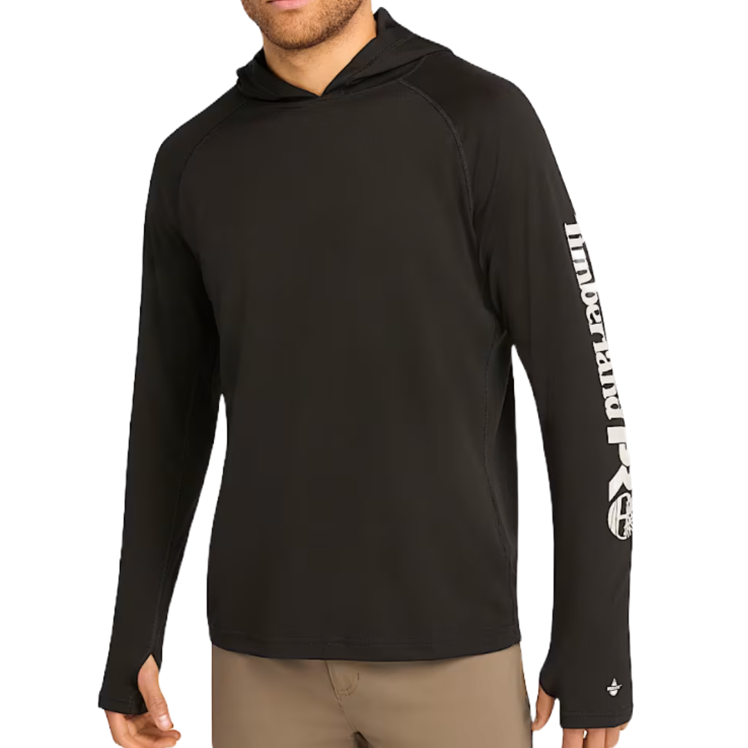 Black long-sleeve performance hoodie with a hood and \“Timberland PRO\“ logo on the left sleeve, designed for moisture-wicking and comfort. Features thumb holes for additional coverage.