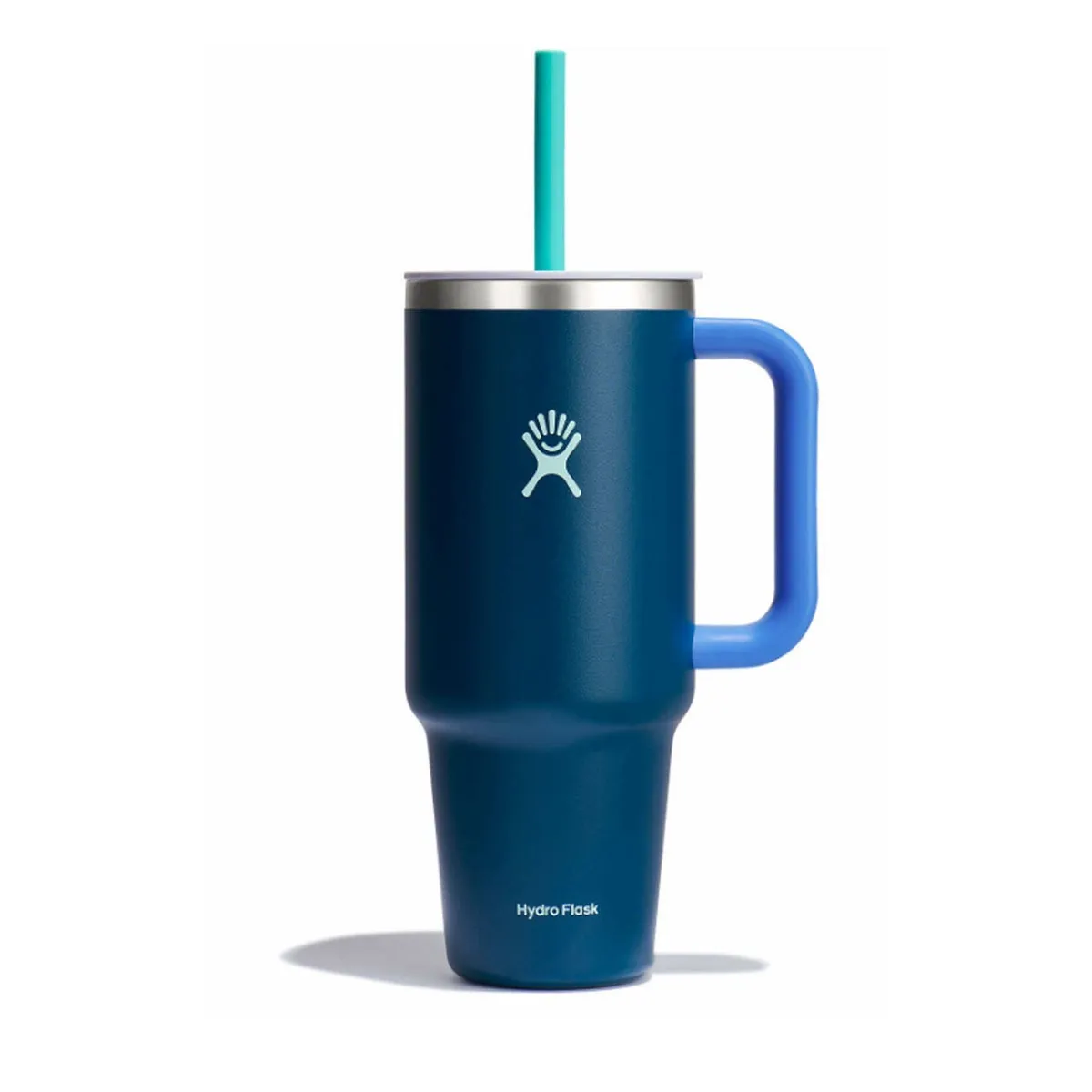 A blue Hydro Flask mug with a handle and reusable straw, featuring the brand's logo.