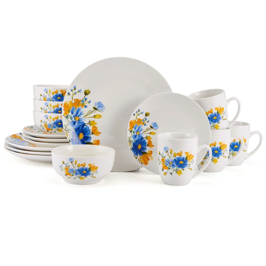 16-piece Pfaltzgraff dinnerware set featuring a floral design with blue and yellow flowers on white dishes, including plates, bowls, and mugs.