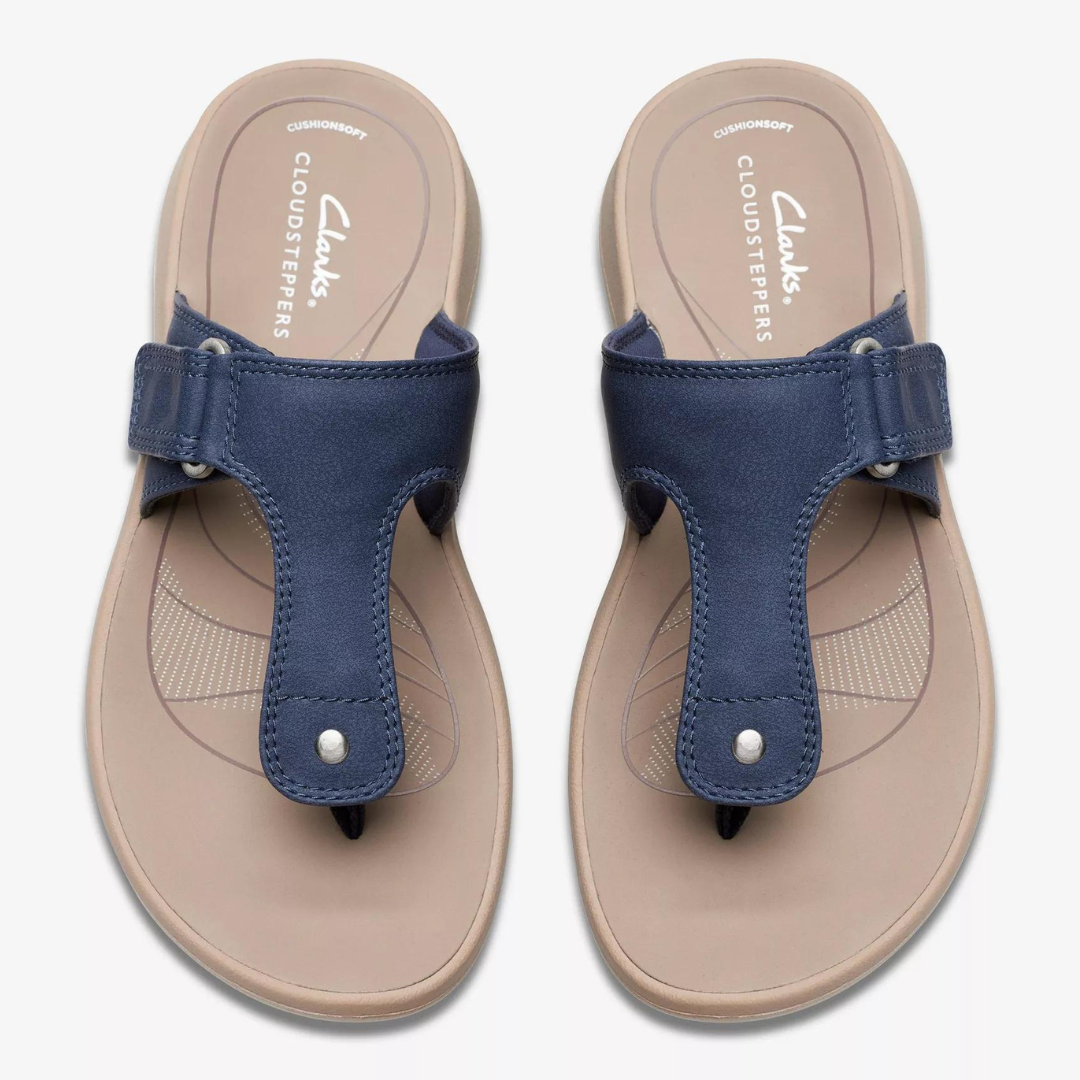 A pair of dark blue thong sandals with adjustable straps and cushioned insoles.