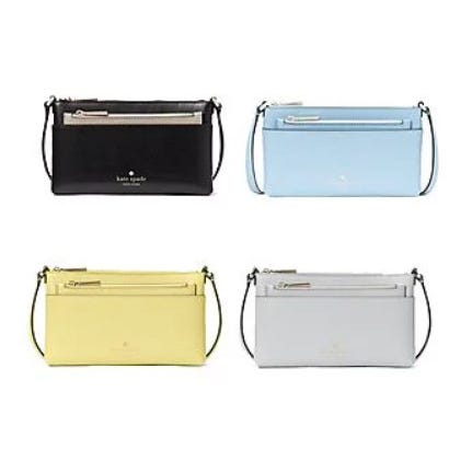Four different colored clutch purses with shoulder straps: black, blue, yellow, and white.