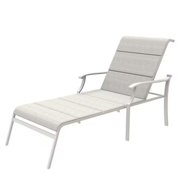 A white, adjustable outdoor lounge chair with armrests.