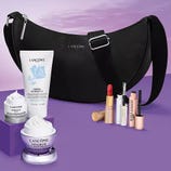 A black Lancôme handbag is paired with skincare and makeup items, including a Crème Radiance cleanser, two Renergie creams, lipstick, mascara, and other cosmetics against a purple background.
