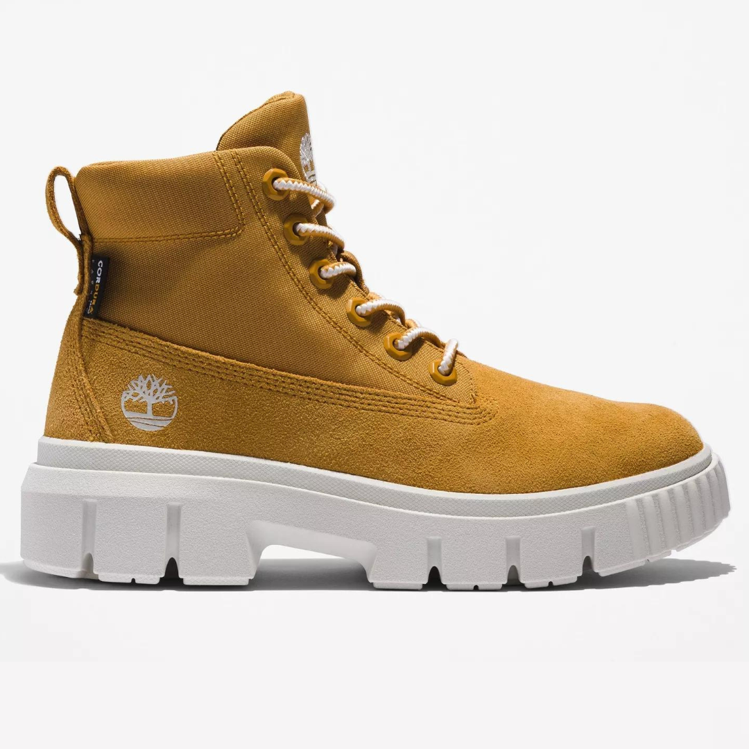 A single yellow high-top boot with a white sole.