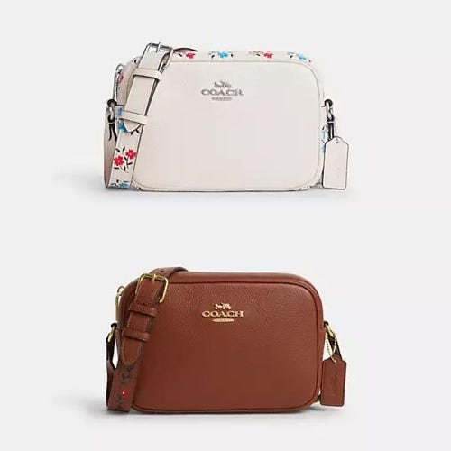 Two Coach crossbody bags, one cream with floral pattern, one solid brown.