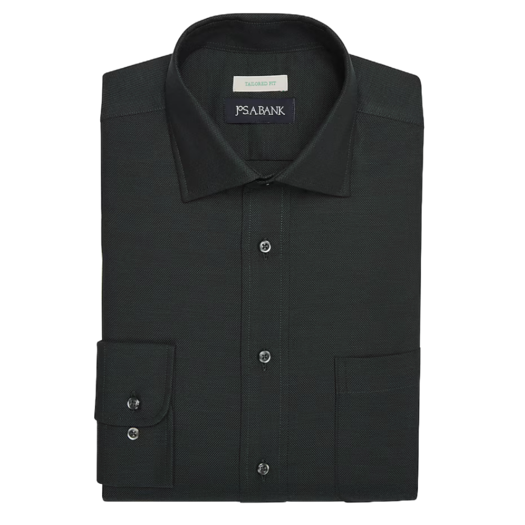 A folded black dress shirt with a tailored fit is displayed, featuring a JOS. A. BANK label, buttoned down front, and a left pocket.