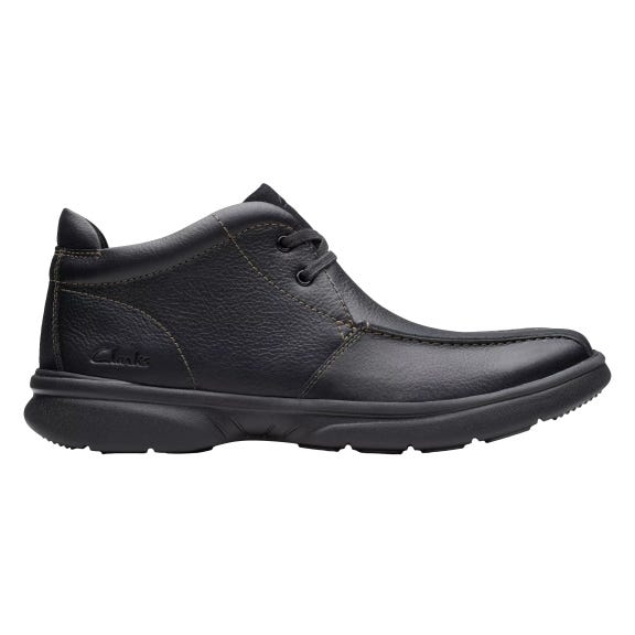 Men's Clarks Chukkas featuring black leather uppers, lace-up design, and cushioned black rubber soles for comfort and durability.