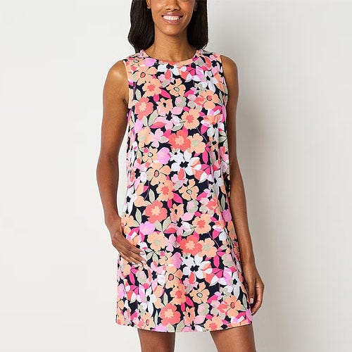 A sleeveless floral dress in shades of pink, black, and white.