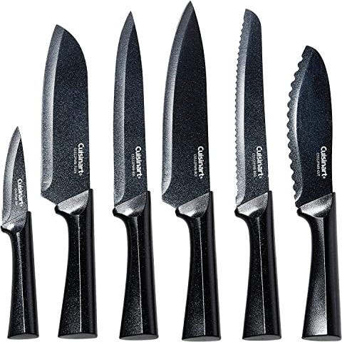 A set of six black Cuisinart knives of varying sizes and blade types, including a serrated bread knife and a paring knife, displayed side by side.