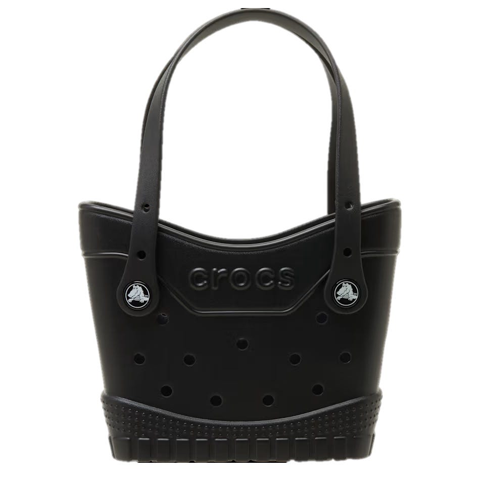 A black hand bag designed to resemble a Crocs shoe, featuring perforations, rubber-like material, and the Crocs logo on both the front and buttons.