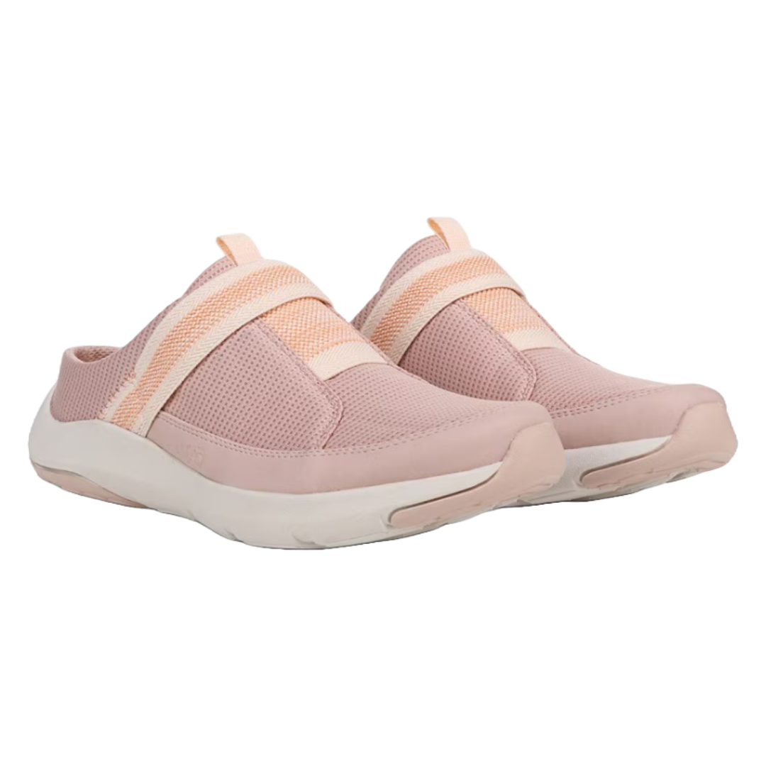 The Ryka Engage Mule Shoes are slip-on mules with a pink mesh upper, featuring elastic cross straps for added support, and a cushioned white outsole designed for comfort and easy wear.