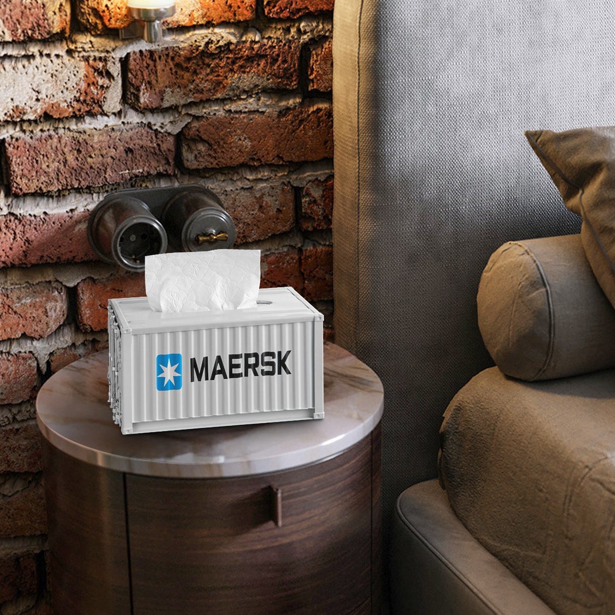 A tissue box designed to resemble a Maersk shipping container.