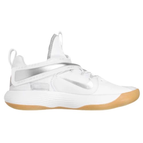 White and silver athletic shoe with a high-top design, strap detailing, and a gum sole.
