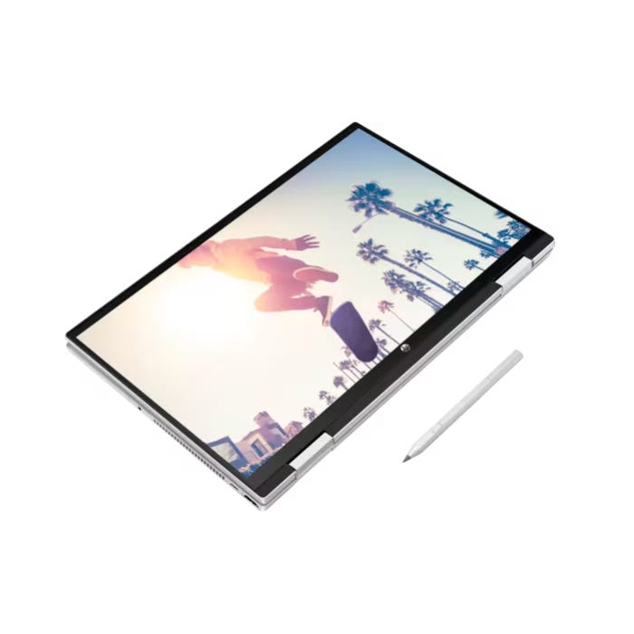A convertible laptop with a stylus pen next to it, displayed in a tablet mode with a colorful screen showing palm trees and a silhouette of a person.