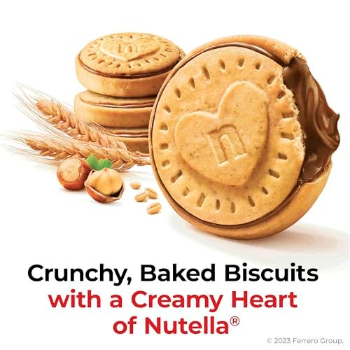 Crunchy, baked biscuits with a creamy heart of Nutella, displayed with hazelnuts, wheat, and a spread of Nutella.