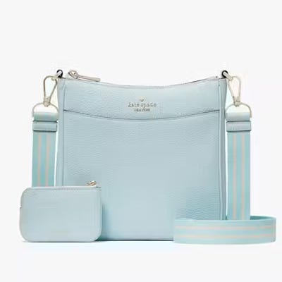 Light blue crossbody bag with an adjustable strap and a matching small zippered pouch.