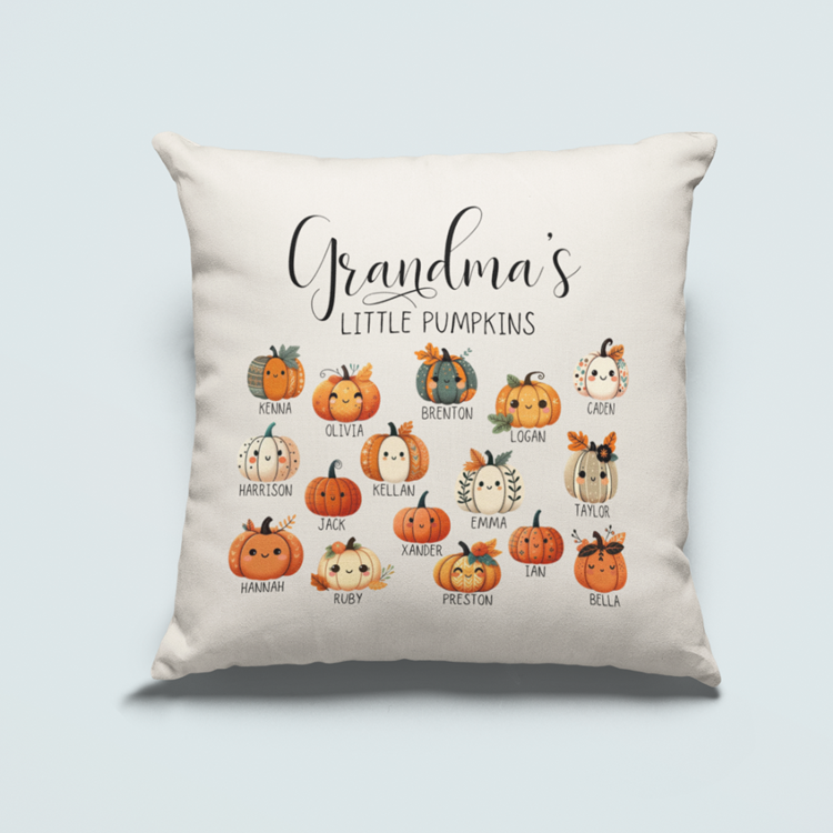 A personalized cushion with the phrase \“Grandma's little pumpkins\“ surrounded by illustrated pumpkins with various names on them.