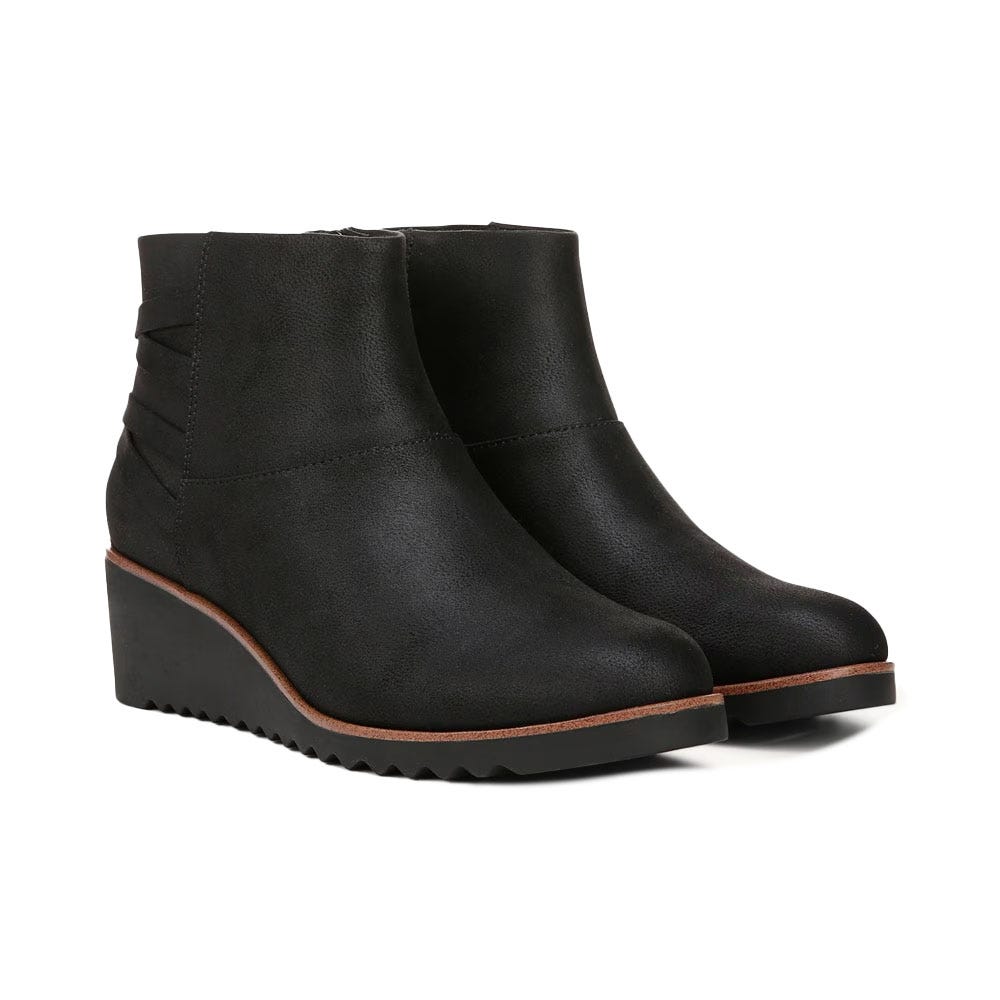 Black wedge ankle boots with a sleek design, featuring a textured finish and side stitching details. The boots have a subtle platform and a rubber sole for added grip.