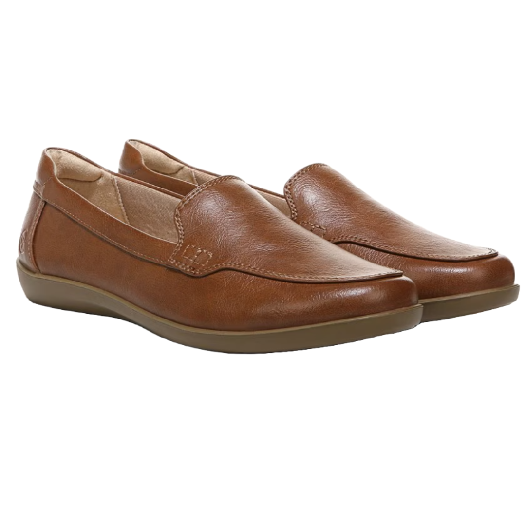 The LifeStride Nina Loafers are brown slip-on shoes featuring a smooth, faux leather upper with subtle stitching details and a cushioned, low-profile sole for comfort.