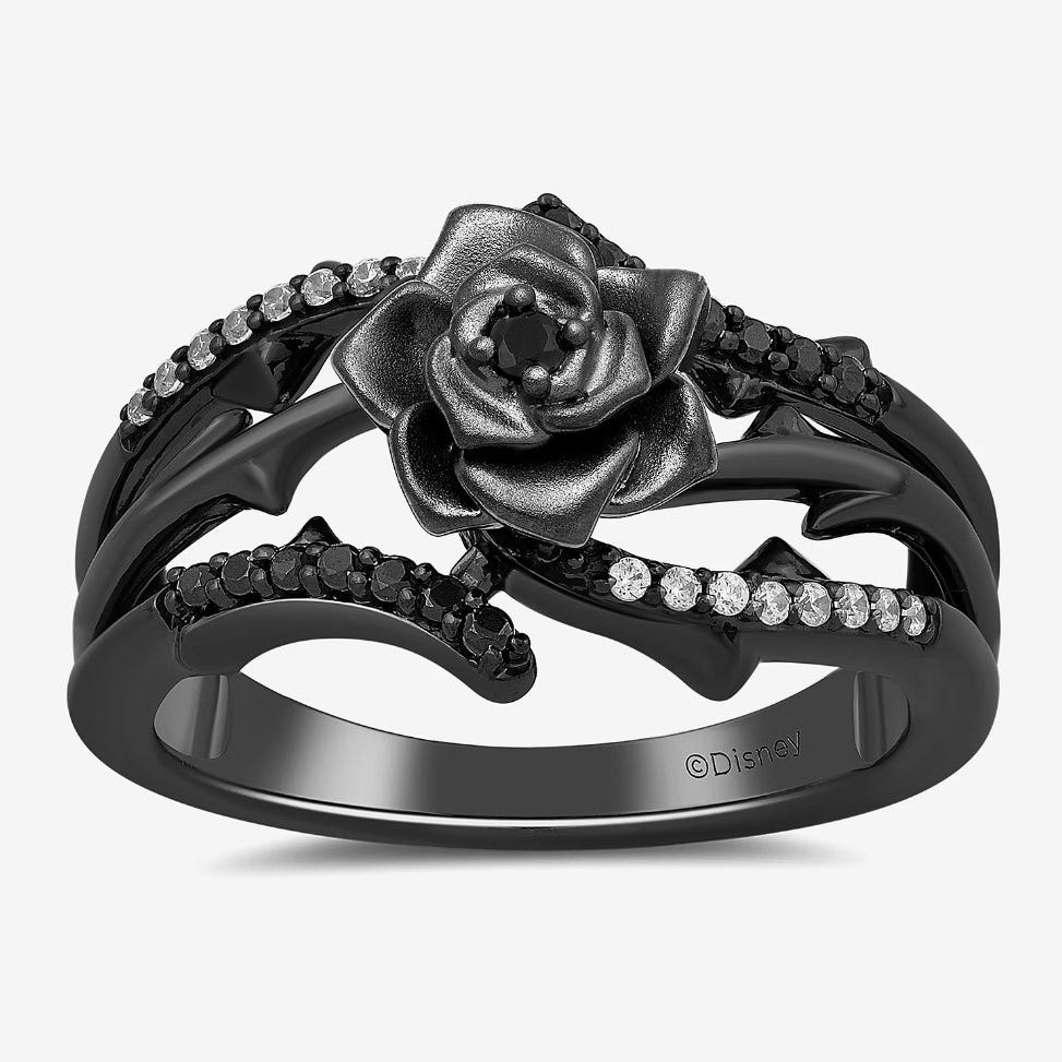 Black Disney-themed ring featuring a rose with black and clear gemstone accents.