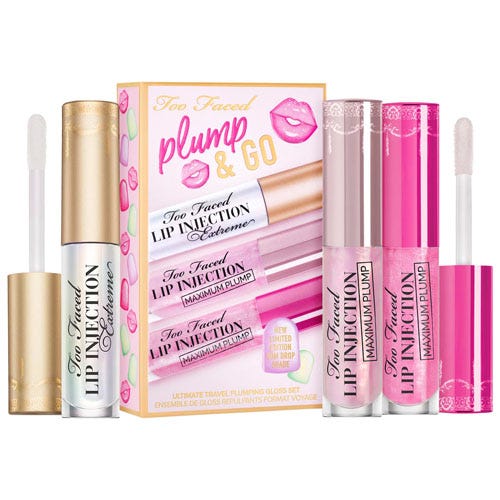 A collection of Too Faced lip plumpers in pastel packaging, including glosses and a lip injection product.