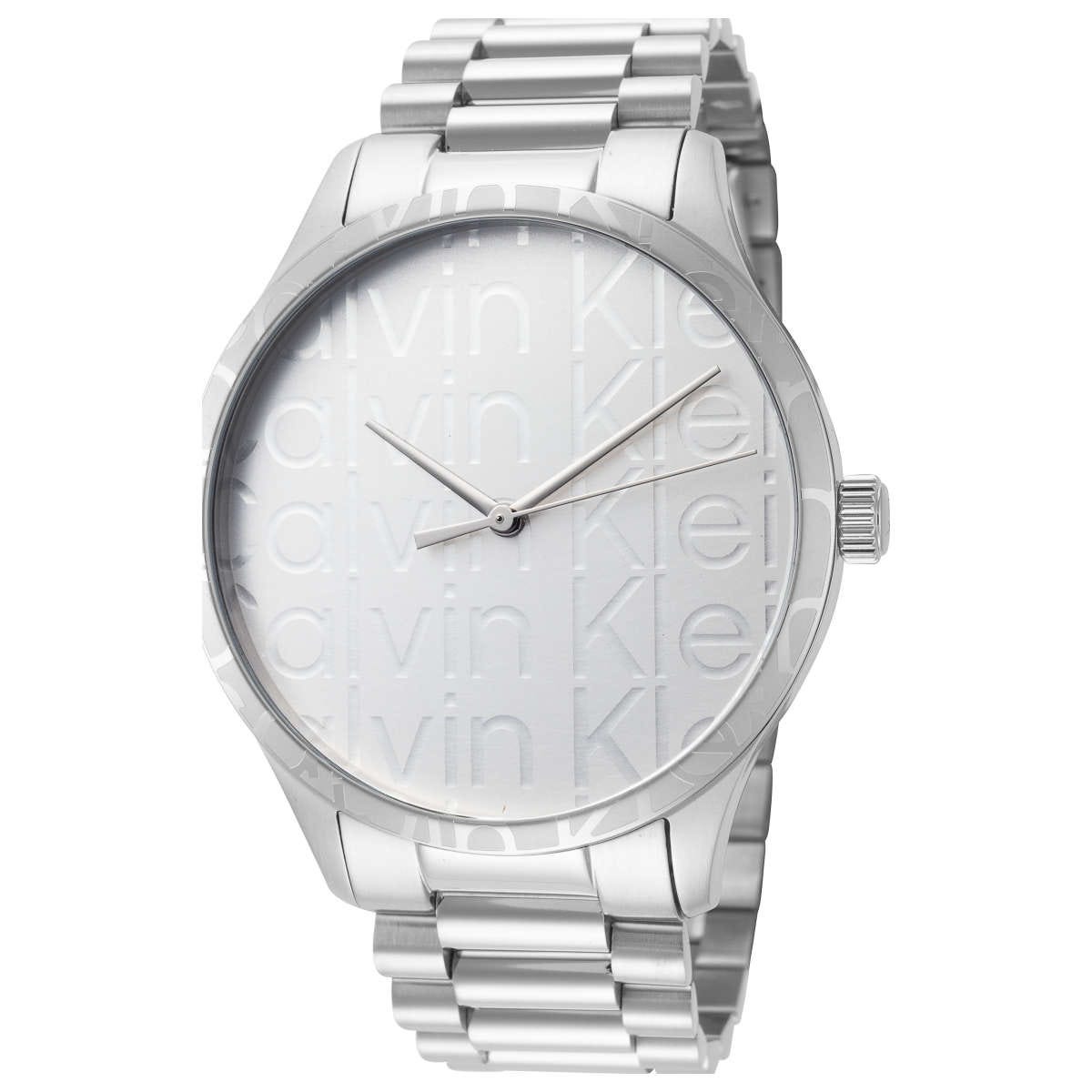 Calvin Klein Men's Iconic Watch features a sleek silver stainless steel bracelet and a minimalist round face with Calvin Klein branding. The watch has a simple silver dial with two hands, maintaining a classic and elegant design.