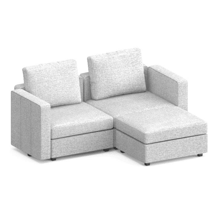 L-shaped sectional sofa with light gray upholstery and plush back cushions.