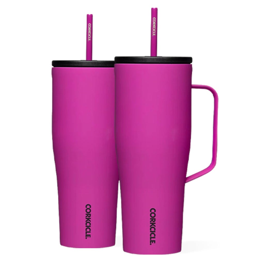 Two magenta 30oz Corkcicle Cold Cup Tumblers, featuring a matte finish, black lids, magenta straws, and one tumbler with a handle.
