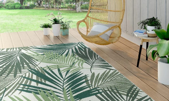 patio with rug and hanging chair
