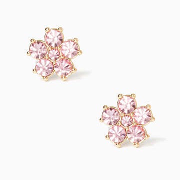 A pair of pink crystal flower-shaped stud earrings with a gold-tone setting.