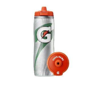 A silver Gatorade squeeze bottle with a green and white design, featuring an orange lid. The lid offers personalization with \“YOUR NAME\“ printed on it.